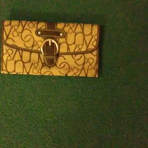 A brown designer women's handbag